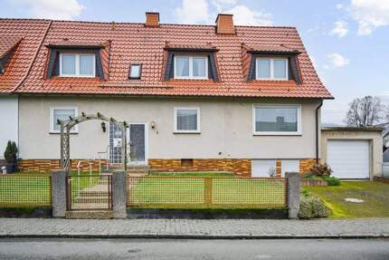 Ruhig gelegenes Zweifamilien-Doppelhaus - Ideal für Familie oder Mehrgenerationenwohnen 8 zimmer