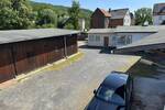 Betriebsgrundstück mit 3 Lagerhallen und einer Wohneinheit zu erwerben zimmer
