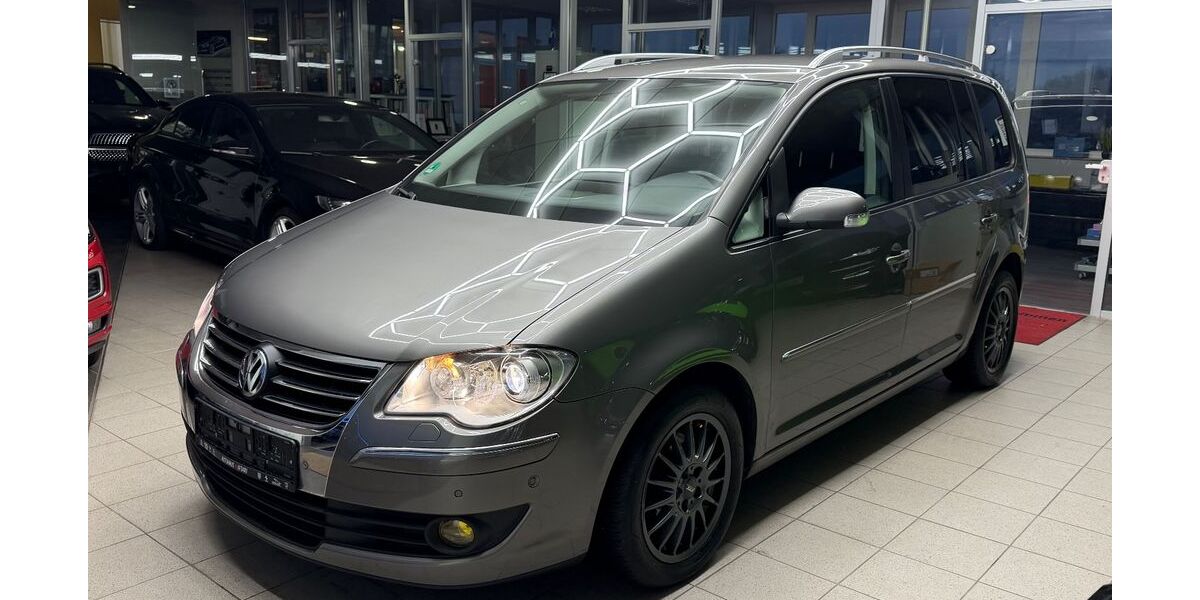 VW Touran 127.205 km 7.499 &euro; Niestetal 34266